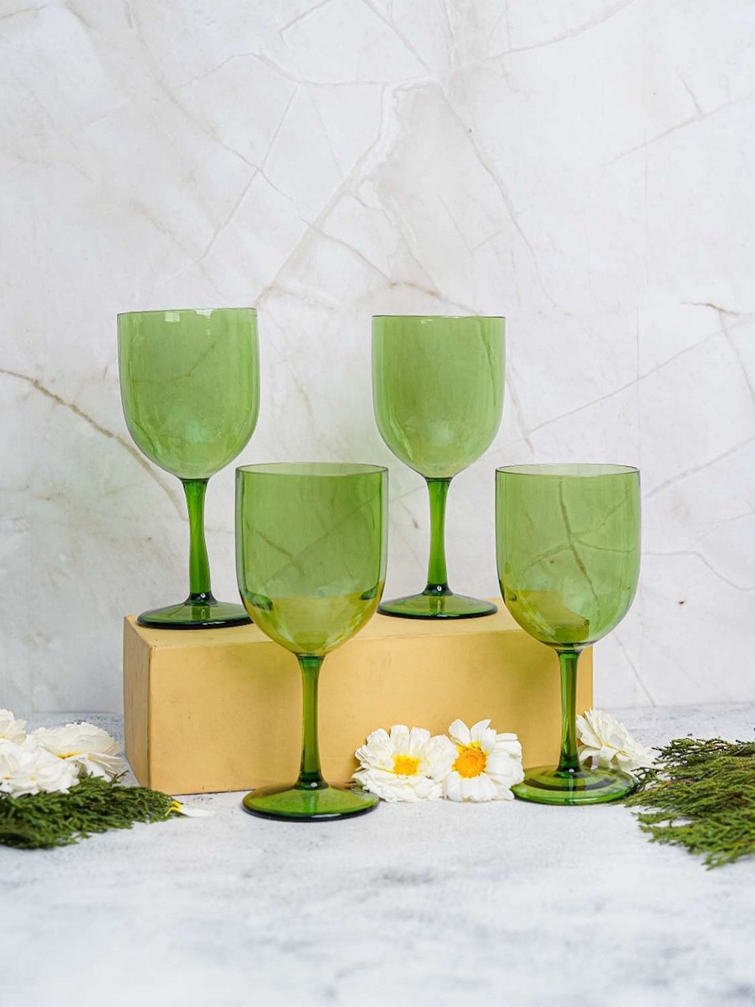Detailed view of the 280ml Prism Hue borosilicate wine goblet, showcasing its unique green hue and elegant shape.