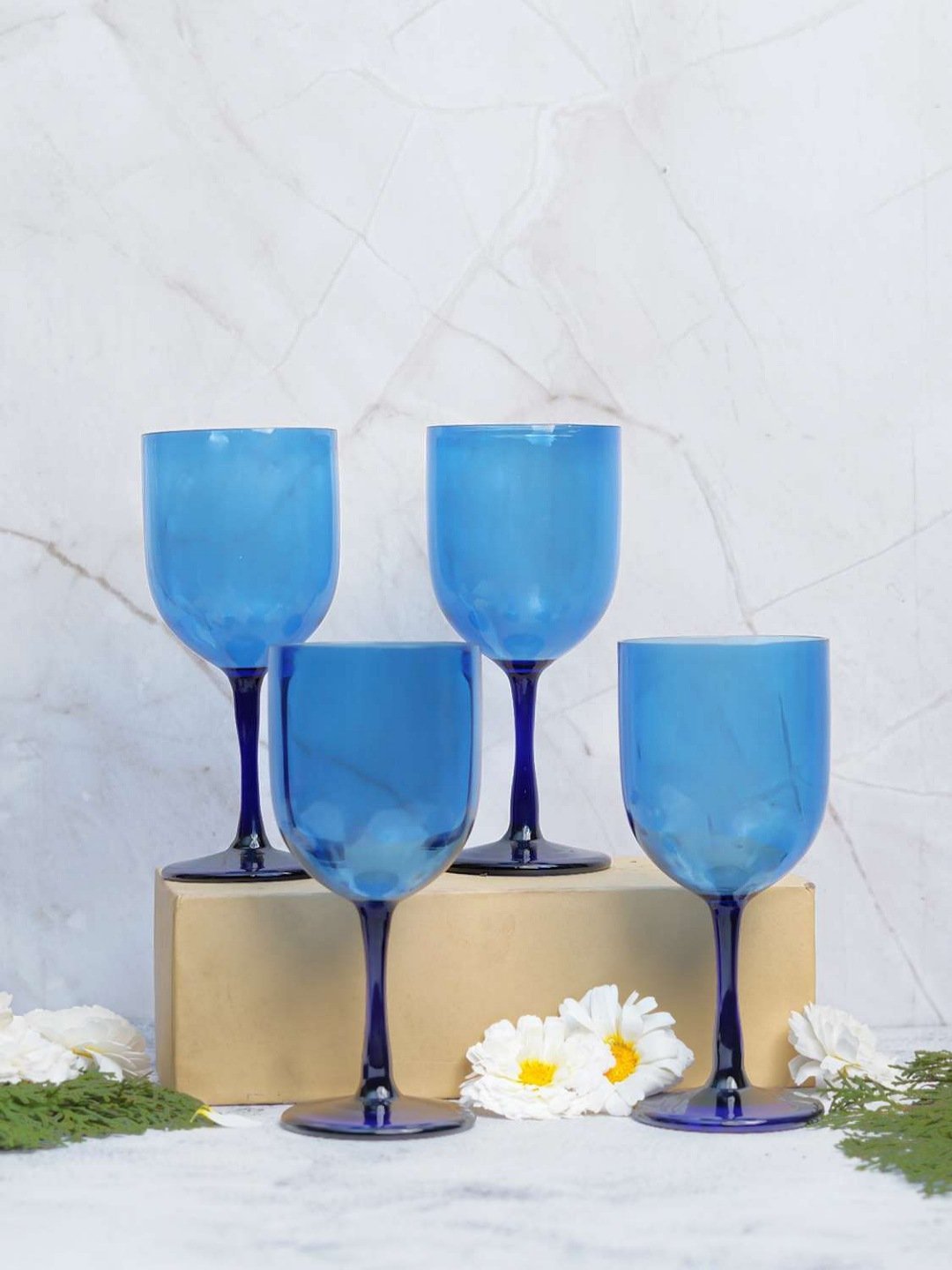 Borosilicate Prism Hue wine goblet with a green tint, ideal for serving wine in a stylish and sophisticated way.