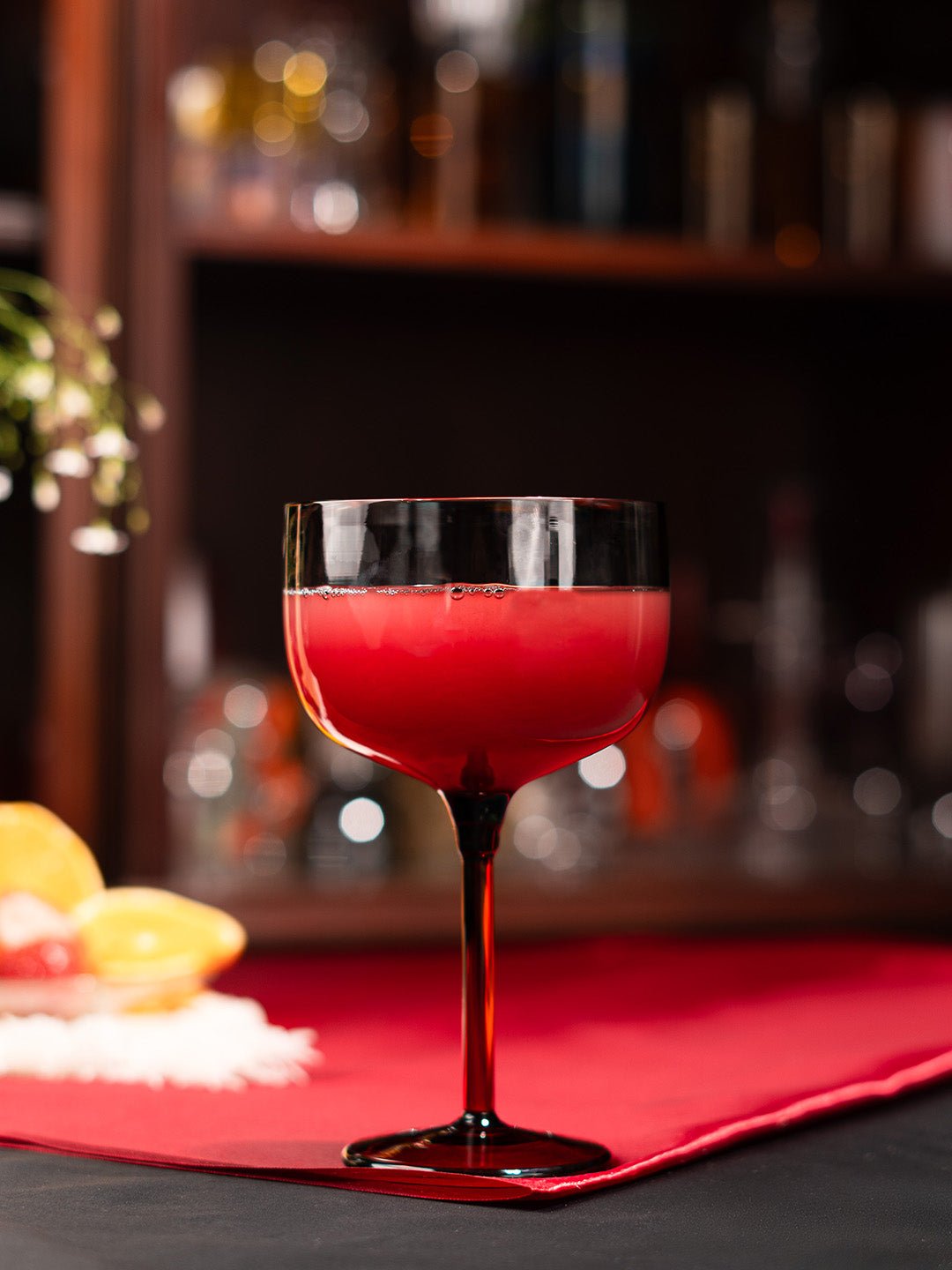 Elegant Eclipse Ember coupe in smokey grey, perfect for wine, cocktails, and sophisticated entertaining.