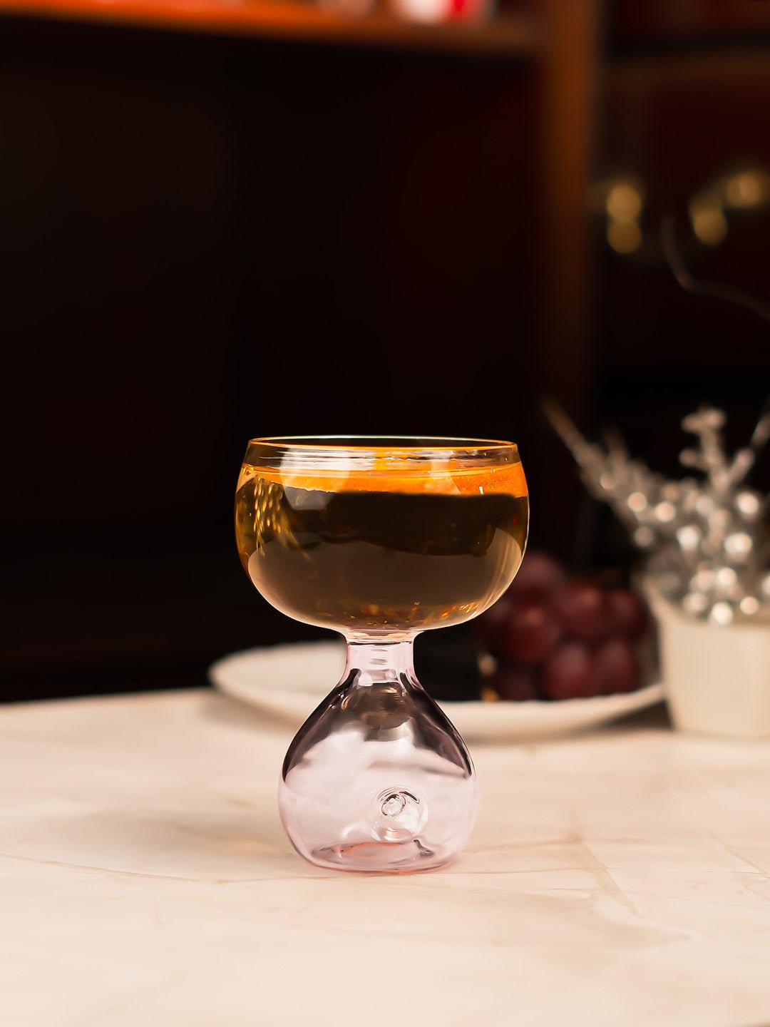 Set of Blossom Orb pink dessert coupes, ideal for adding sophistication to cocktails and sweet treats.