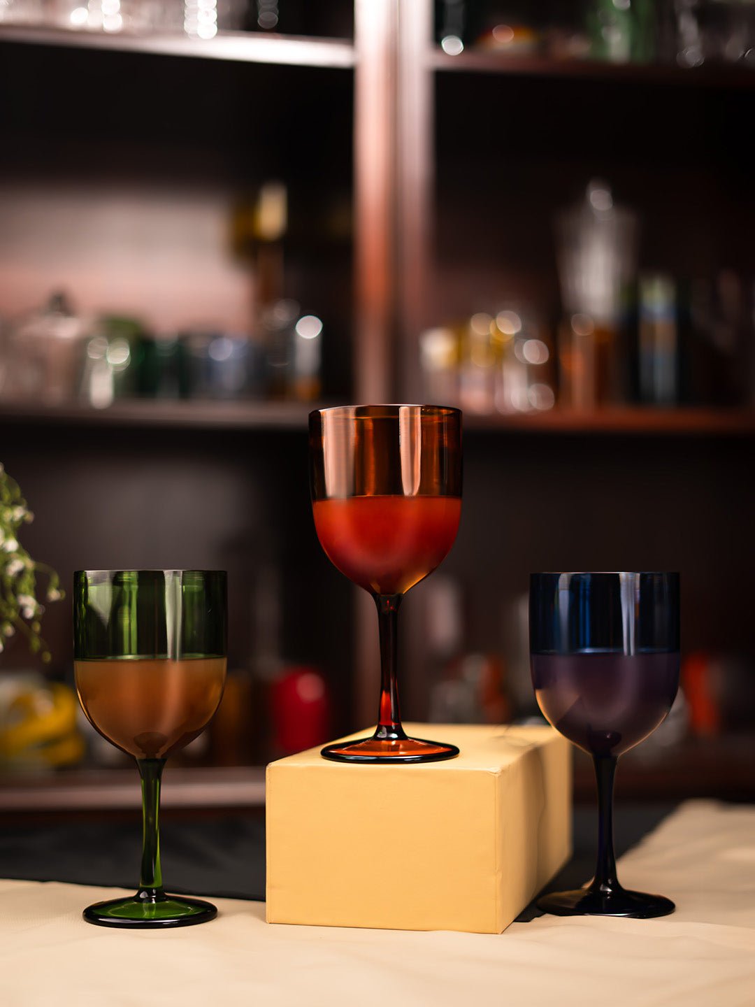 Elegant 280ml borosilicate Prism Hue wine goblet with a green tint, 180mm tall, perfect for refined wine tasting.