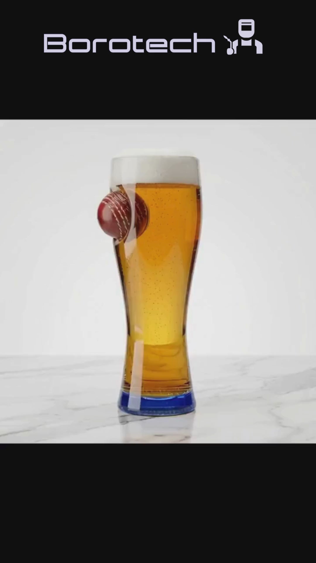 Load video: Borotech Cricket Series Borosilicate Hand Blown Beer Glass with Real Leather Cricket Ball, 450 ml Capacity, Real Leather mini Ball detatchable Style (Blue)