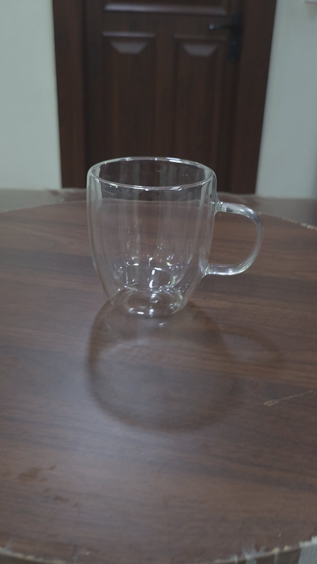 Load video: Double Wall Glass Mug