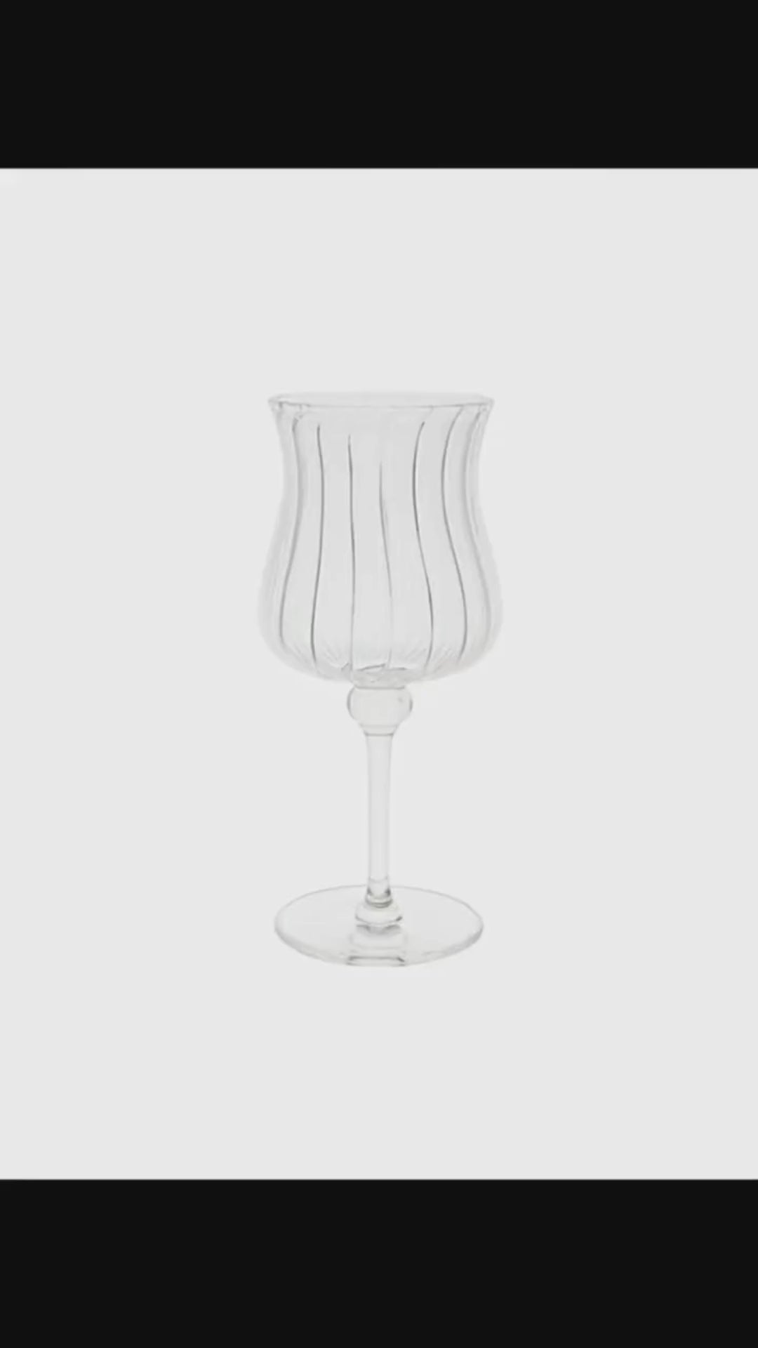 Load video: Bloom Fluted Stem Glass Set (Set of 2) – Spring-Inspired Elegant Drinkware