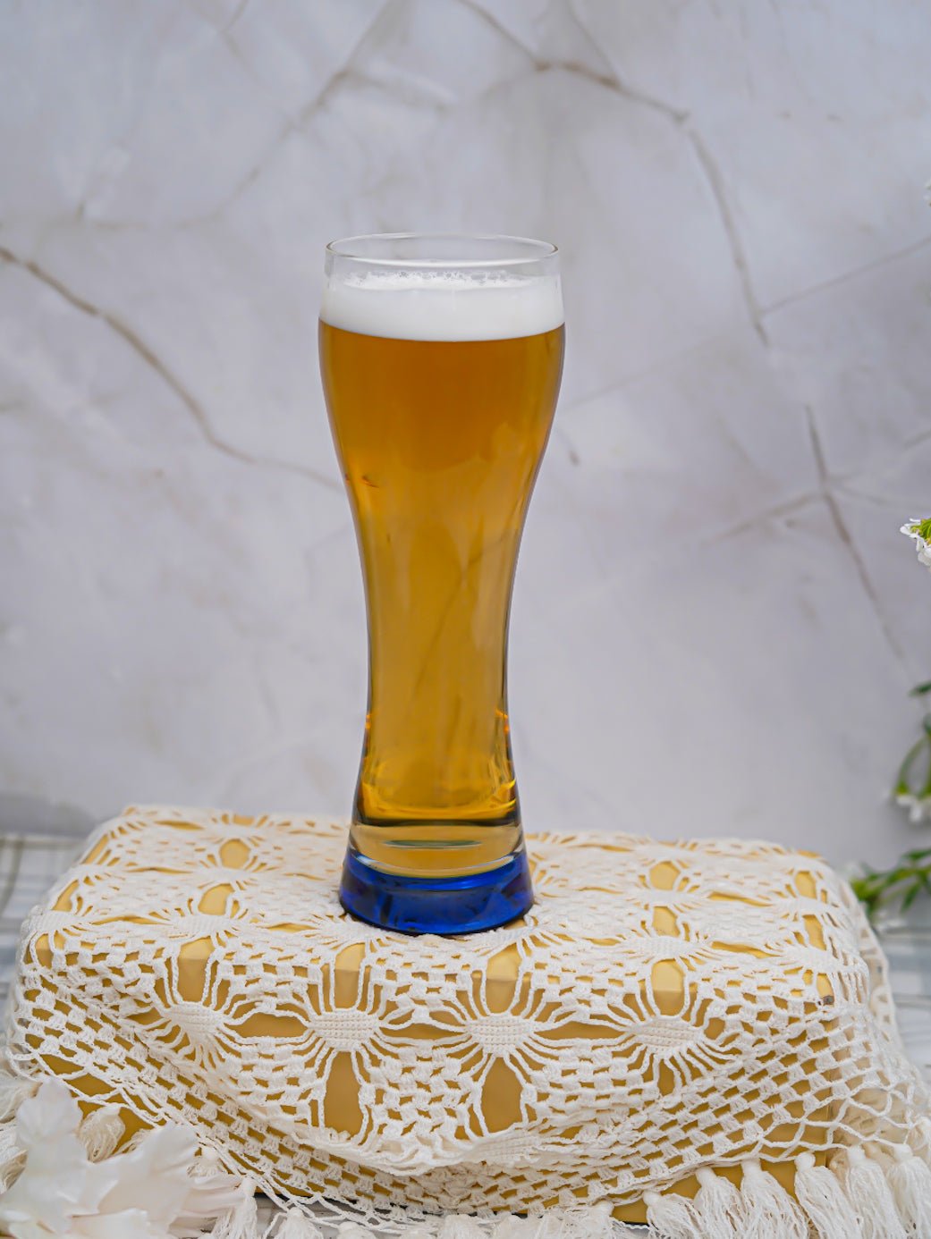 Set of borosilicate pilsner glasses stacked, showcasing their space-saving, durable, and premium-quality design.